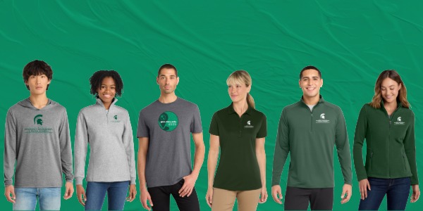 Group of people wearing various MSU Geography-branded apparel