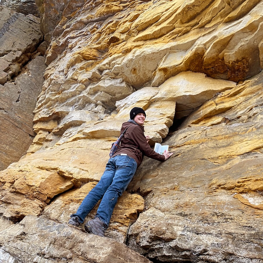 Amber Hazel climbing rockface