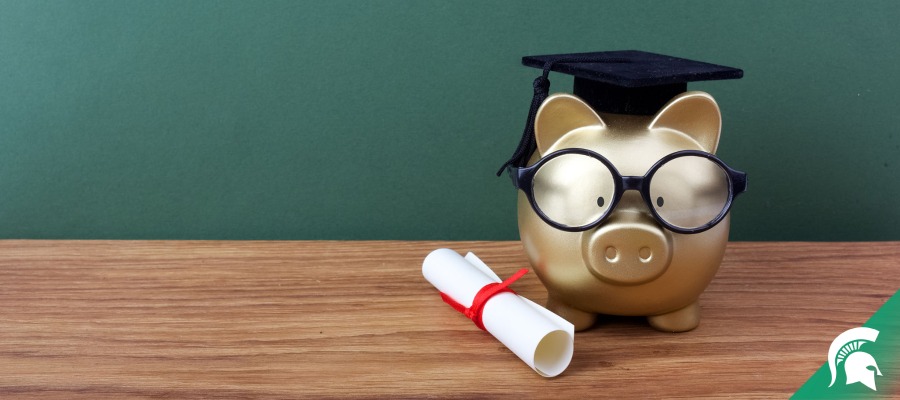 piggy bank with mortarboard