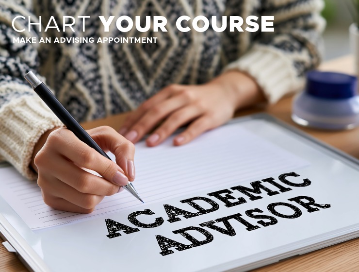 Person wearing colorful sweater pointing to whiteboard with text Academic Advisor