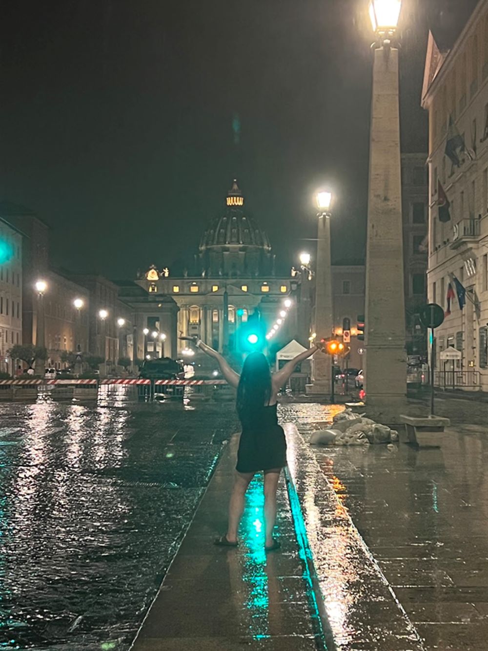 Malory Curtis, a rainy evening in front of St. Peter's Basillica, the Vatican.